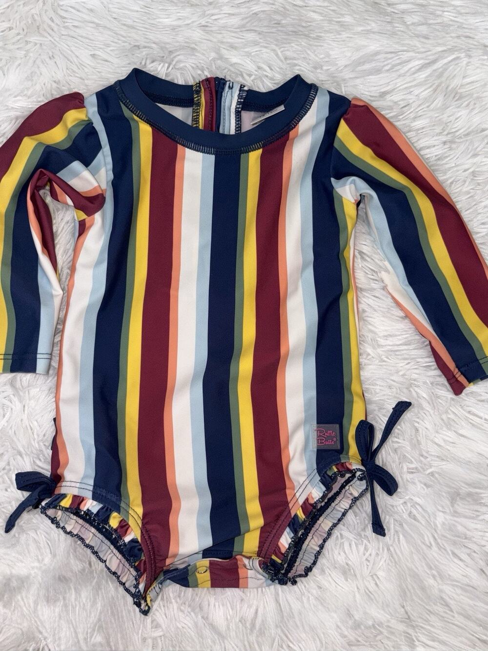 Ruffle Butts Girls 12/18 Mos. One Pc. “Sunset Stripes” Suit. Excellent Condition
